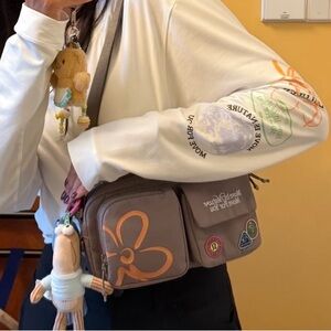 Lululemon Athletica Gray Crossbody Bag with Orange Flower